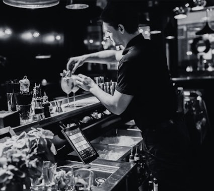 Bartender serving a drink in a nightclub using Nyx